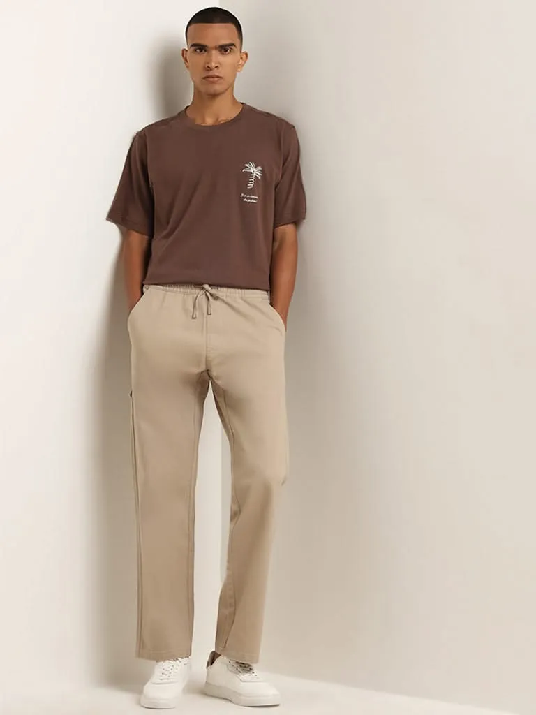 Nuon Beige Relaxed Fit Solid Cotton Mid Rise Pants